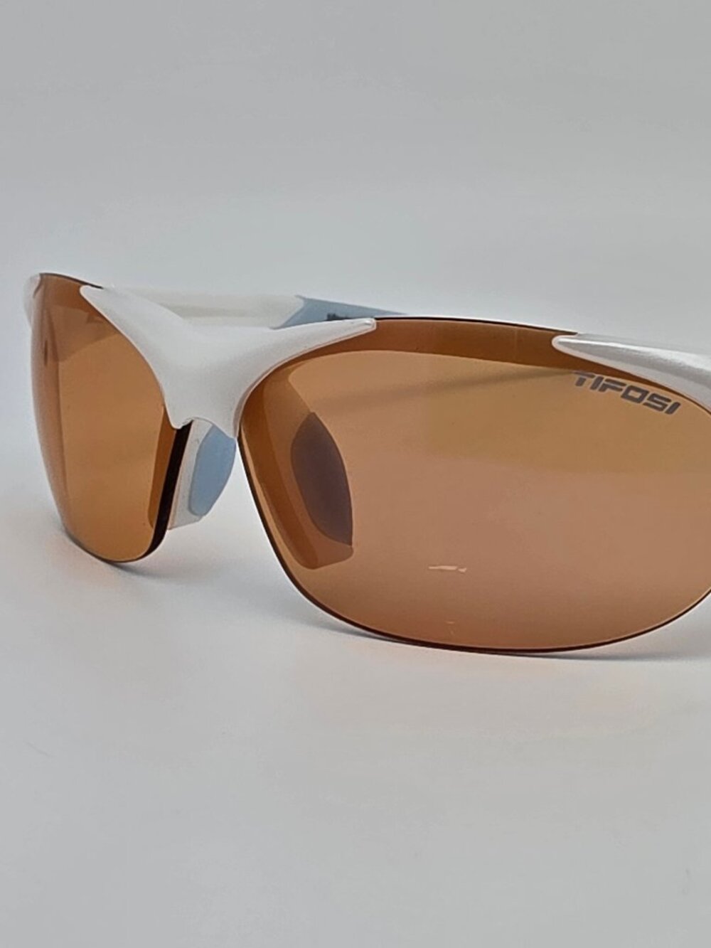 Tifosi Wisp Pearl White Baby Blue Frame Purple Mirror Lens Rimless Sunglasses